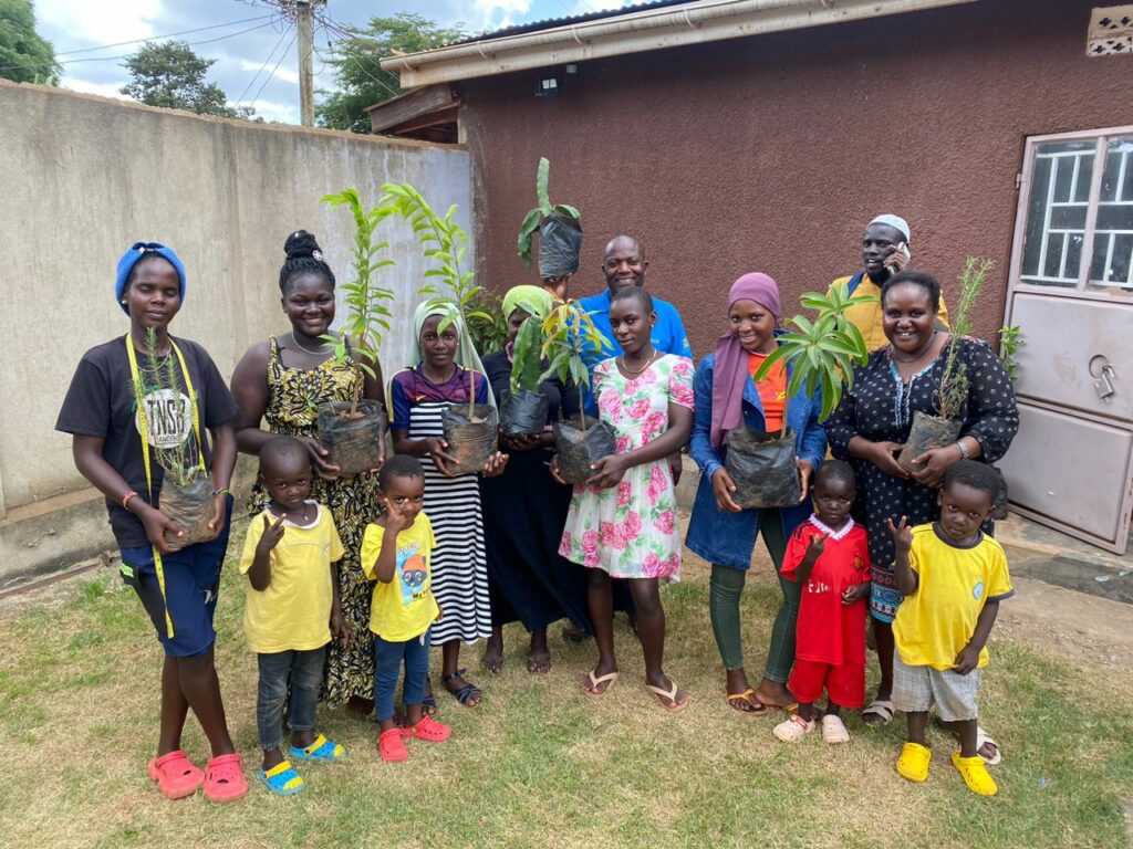 Twg members with new saplings to be planted in the community